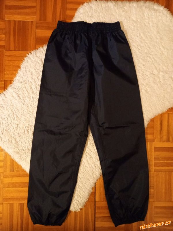 Nepromokavé šusťákové kalhoty