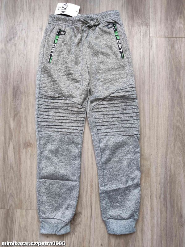 Softshellové zateplené tepláky 164