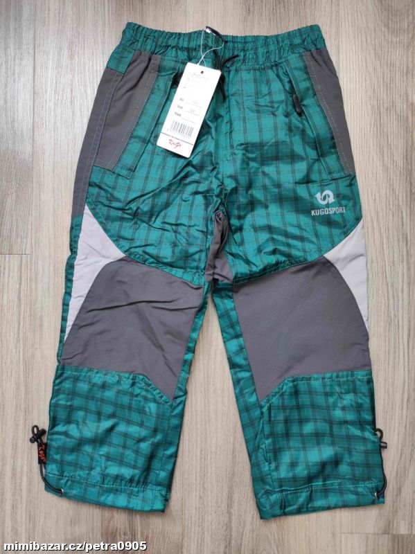 Chlapecké jarní šusťákové kalhoty Kugo vel. 104