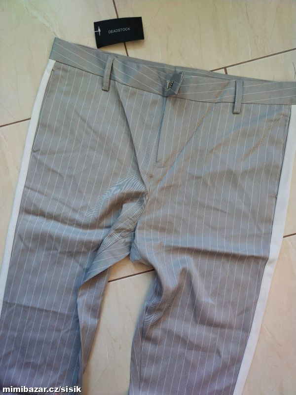 Dámské světlé kalhoty s proužkem