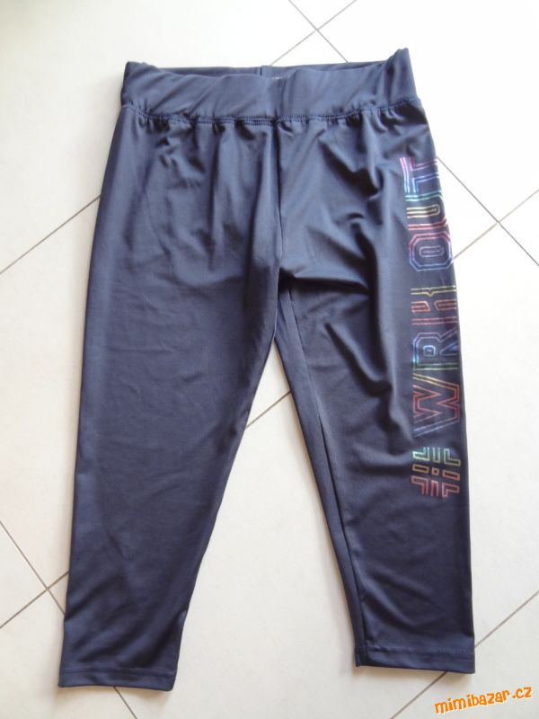 tmavěmodré sportovní 3/4 legíny vel. 158/164