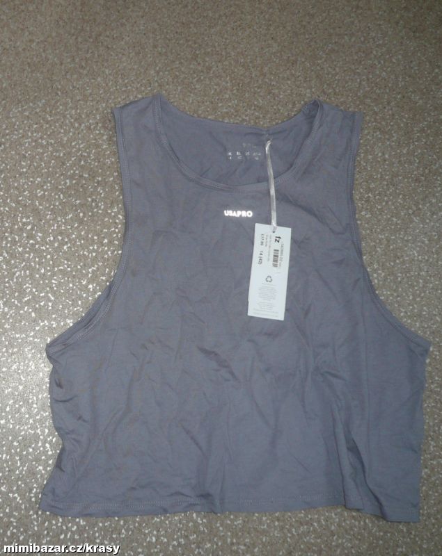 USA Pro nádherné nové fialové bav.tílko EUR 42