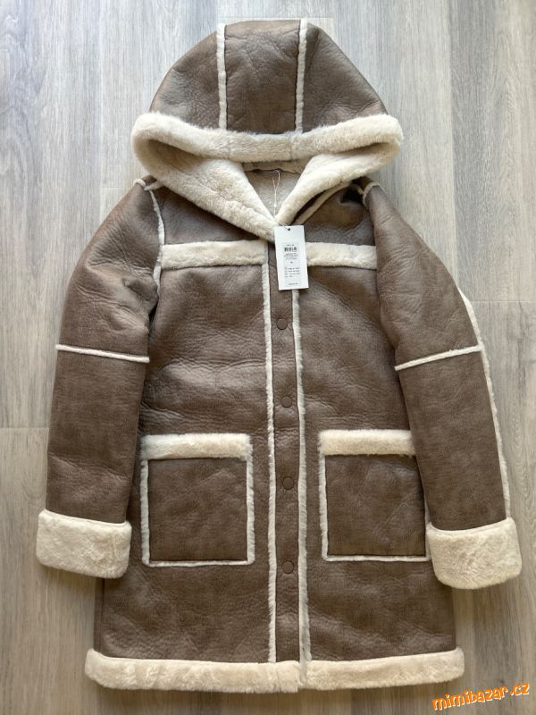 Nenošený kabát s visačkou