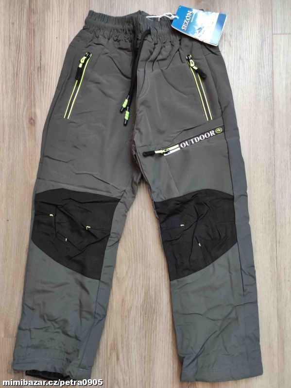 Zimní šusťákové kalhoty 146