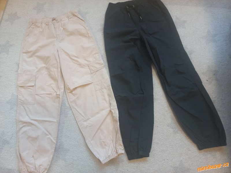 Pytlové kalhoty černé a béžové