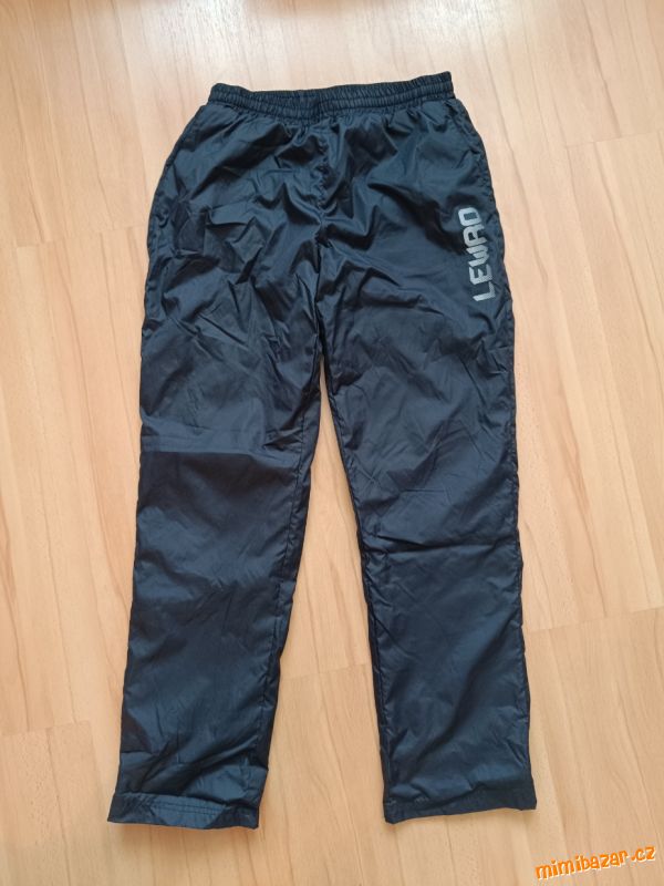 zateplené šusťákové kalhoty fleecem