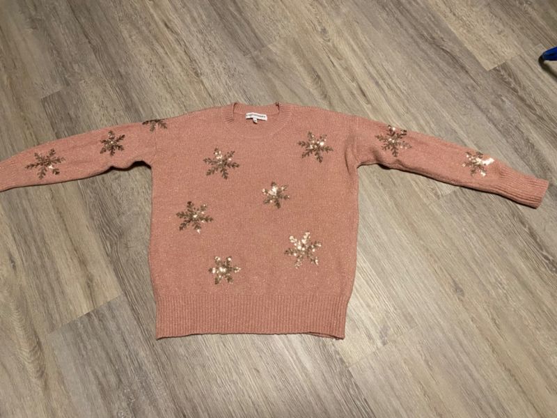 Růžový svetr