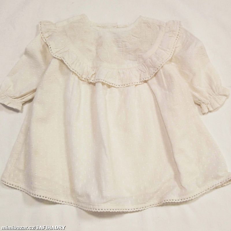L115. Smetanové šaty