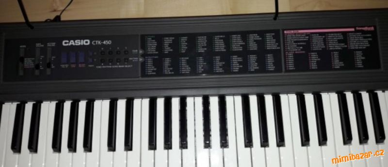 Keyboard Casio CTK - 450 s dřevěným kufrem