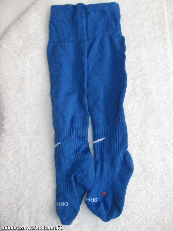 Dětské modré fotbalové štulpny NIKE